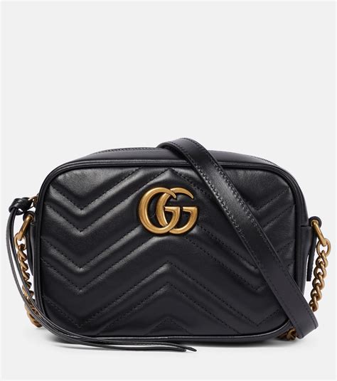 mini GG matelassé crossbody bag .